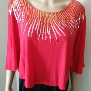 Solution S/M red sequin top with dropped sleeves.